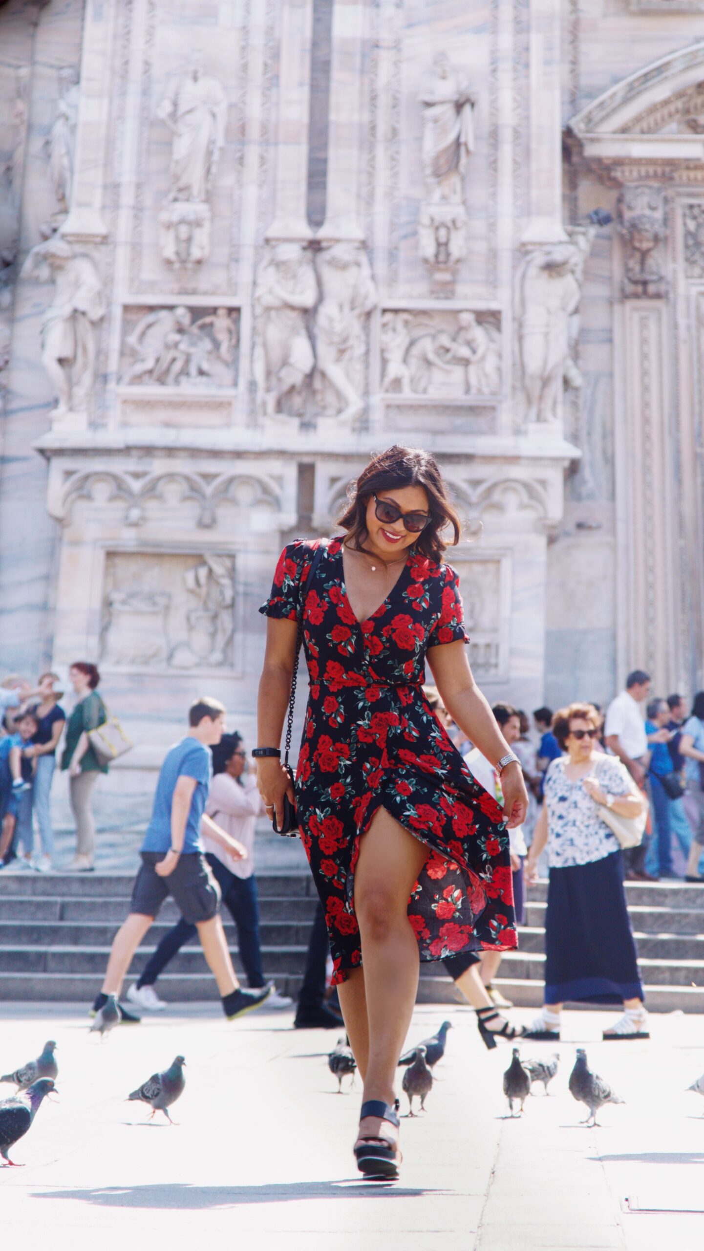 A healthy relationship with yourself. Fashion blogger outside of Duomo di Milano wearing a rose printed summer dress from Primark, black and brown wedges from Vince Camuto and a Rebecca Minkoff handbag.